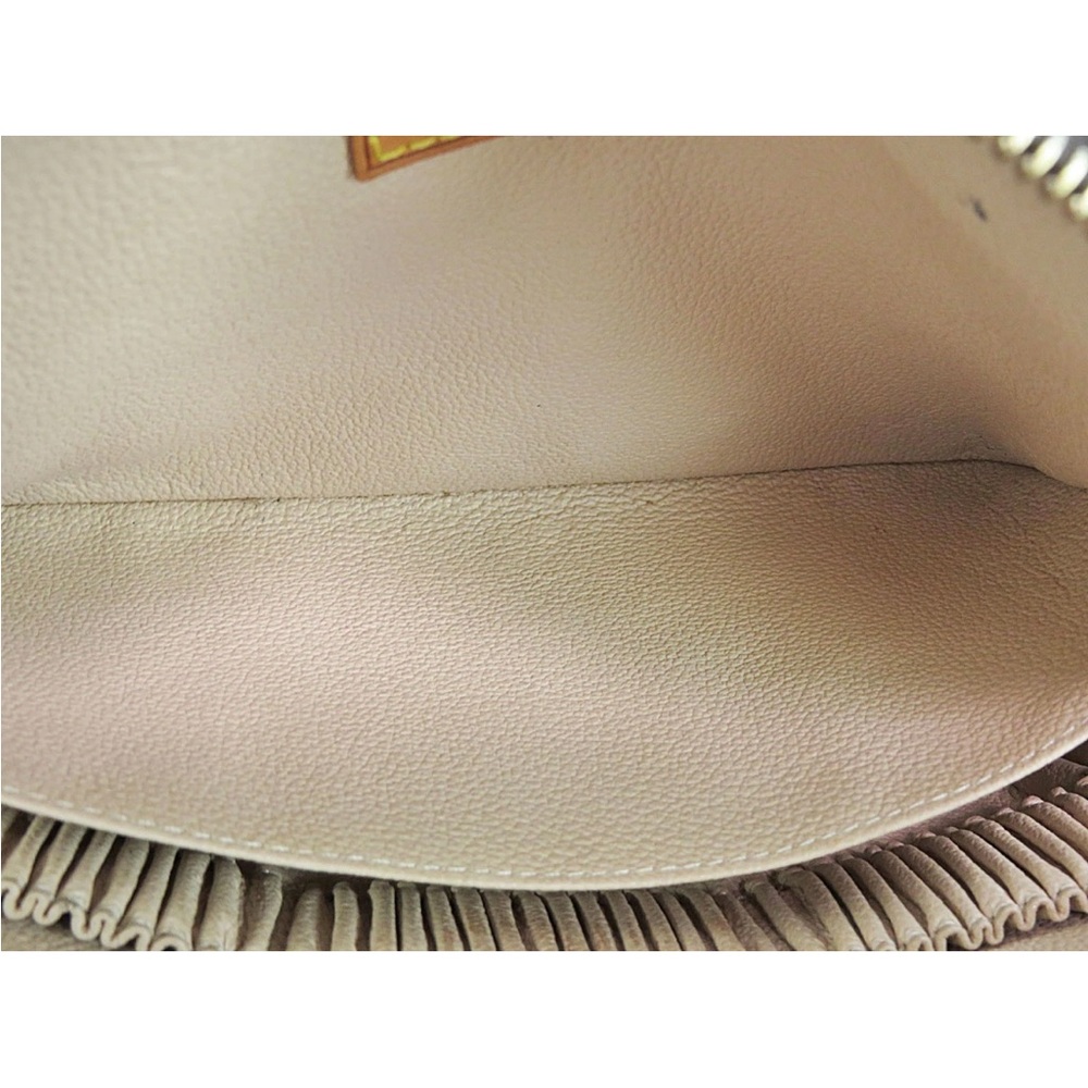 Louis Vuitton Monogram Toiletry Bag in Brown and Gold - Picture 12 of 16